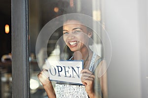 Cafe open sign, window portrait and happy woman with smile for retail service, restaurant welcome or coffee shop opening