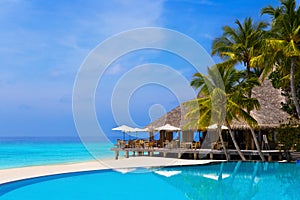 Cafe and pool on a tropical beach