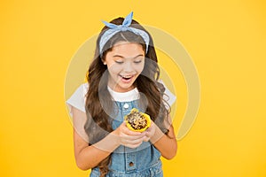 Cafe restaurant food. funny retro girl muffin yellow background. happy child love desserts. Yummy cupcakes. happy