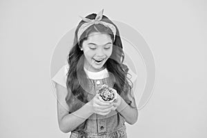 Cafe restaurant food. funny retro girl muffin yellow background. happy child love desserts. Yummy cupcakes. happy