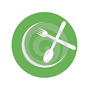 Cafe or restaurant serving Organic food logo- Green Plate with spoon and fork symbolizing Vegan friendly diet by European photo
