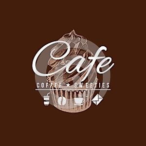 Cafe sign with hand drawn cupcake.