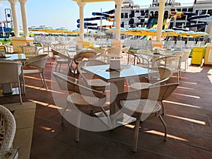 Cafe Table and Chairs on Beach Setting in Black and White Sepia Tone