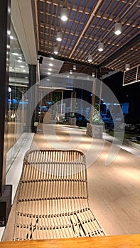 Cafe table and chairs outdoors at night.