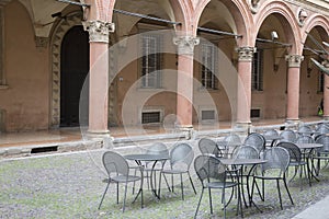 Cafe Table and Chairs with Portico; Santo Stefano Street; Bologna