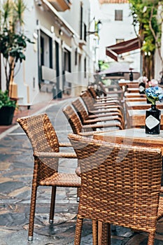 Cafe tables on Streets of Marbella, Spain