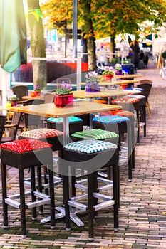 Cafe terrace in autumn city