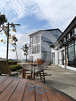 Cafe view with wooden chair and table