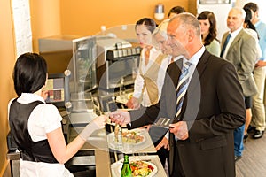 Cafeteria business man pay by credit card cashier