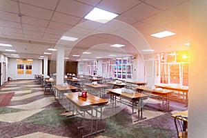 Cafeteria, dining room in university, cafe with tables and chairs, counter bar hotel.