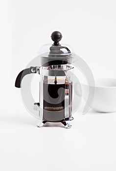 Studio shot of Cafetiere and cup photo