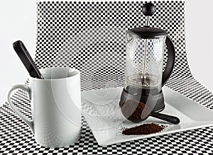 Cafetiere and cup