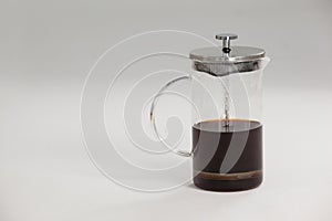 Cafetiere on white background