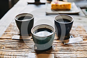 Caffeine-free beverage. Ceramic Cups of Herbal Coffee on Wooden Table. Coffee made from acorns, chicory, roasted barley