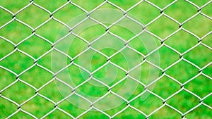 Cage metal net front the lawn.