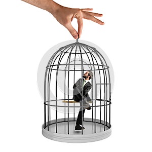 Caged businessman