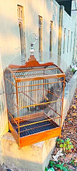 the cages of birds from wooden by handmade skills photo