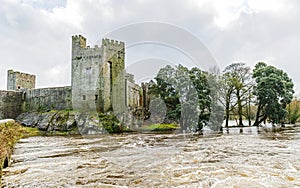 Cahir castle on the flooded Suir riverside photo