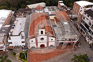 Caicedo, Antioquia - Colombia. March 17, 2024. Aerial view with drone of the municipality\'s church, of Catholic worship photo