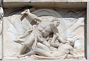 Cain killing Abel, marble relief on the facade of the Milan Cathedral