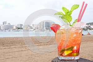 Caipirinha cocktail on beach photo