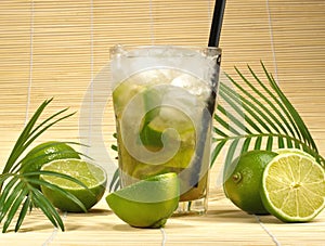 Caipirinha Cocktail with Limes on wooden Background