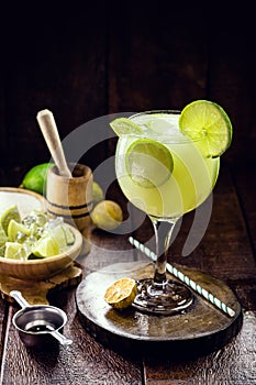 Caipirinha, typical Brazilian drink made with distilled beverage, lemon, sugar and fruits, cold summer drink