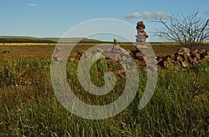 A cairn is a manmade pile of stones in the veld