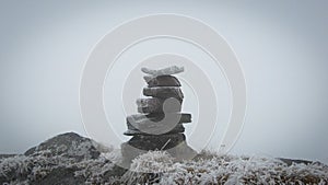Cairn in the fog photo