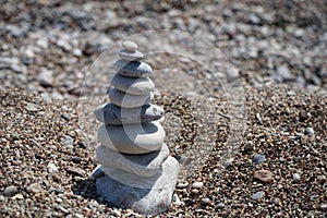 Cairn of stones on the beach. Kolympia, Rhodes, Greece