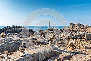 Cairns in front of Goury lighthouse, Cap de la Hague,