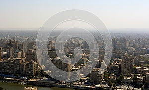 Cairo Egypt cityscape , panoramic view of Cairo and Giza together with many modern buildings and the pyramids of Giza are seen