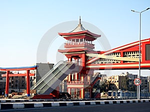 Cairo, Egypt, July 31 2022: A pedestrian bridge finished in traditional Japanese architectural style in Shinzo Abe new patrol