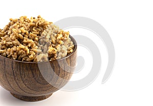 Cajun Dirty Rice in a Wooden Bowl on a White Background