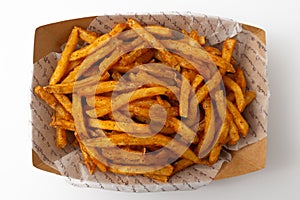 Cajun French fries on a white background