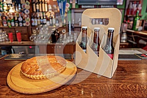 Cake and alcohol drinks situating on counter