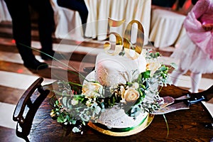 Cake anniversary in 50 at table