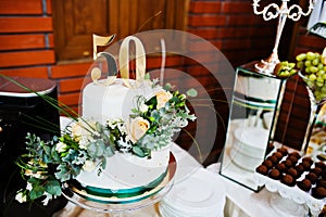 Cake anniversary in 50 at table