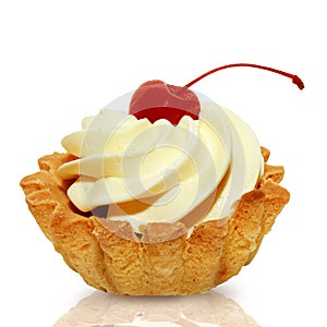 Cake basket with cream and cherry