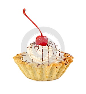 Cake basket with cream and maraschino cherry