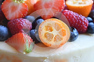 Cake with berries on top.