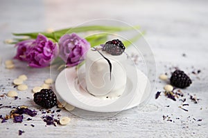 Cake with blackberry and tulip, Valentines Day background. Selective focus