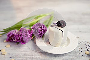 Cake with blackberry and tulip, Valentines Day background. Selective focus