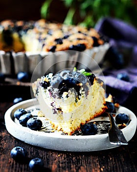 Cake with blueberries in ceramic form