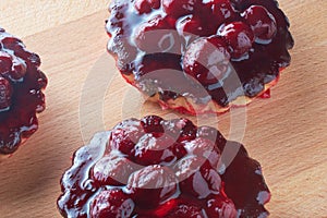 Cake with cherry, raspberry in jelly. Red Jello dessert with berry fruit, homemade dessert