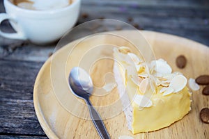 Cake and coffee cup on table