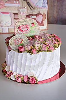 Cake with cream colored roses photo