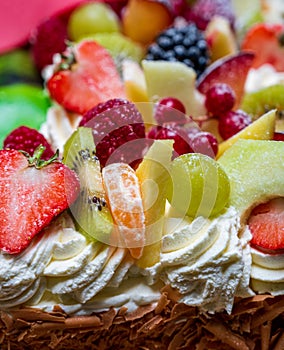 Cake with cream and pieces of fruit