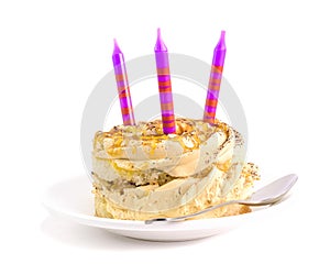 Cake with cream and three candles