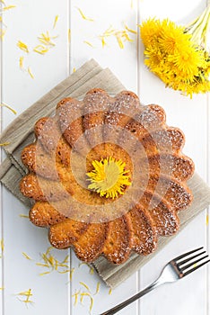 Cake with dandelion's flowers